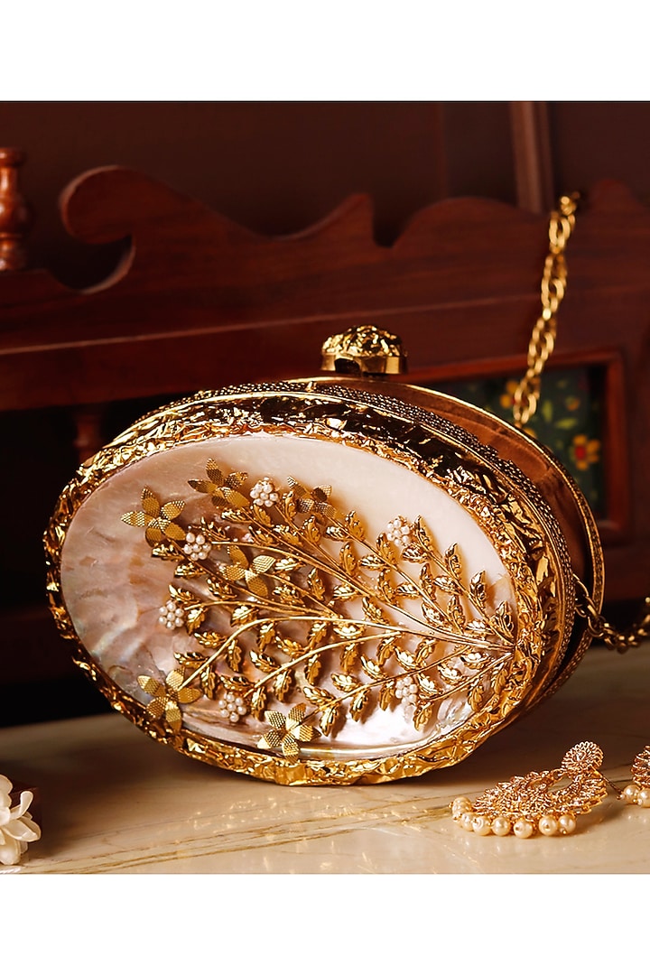 Gold Metal Mother of Pearl & Sequins Embellished Floral Clutch by THE TAN CLAN at Pernia's Pop Up Shop