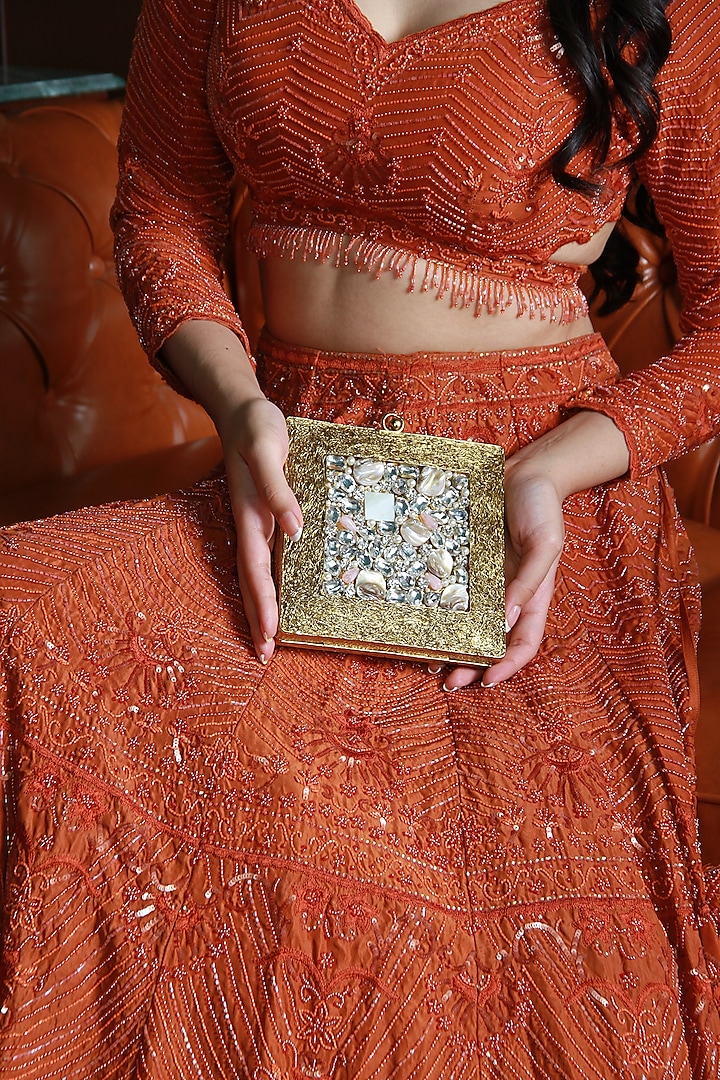 Antique Gold Metal Mother Of Pearl & Sequins Embellished Clutch by THE TAN CLAN at Pernia's Pop Up Shop