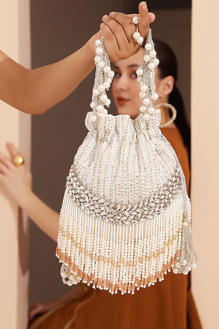 White Velvet Hand Embroidered Potli by THE TAN CLAN at Pernia's Pop Up Shop