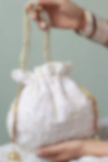 White Raw Silk Pearl Hand Embroidered Potli by THE TAN CLAN at Pernia's Pop Up Shop