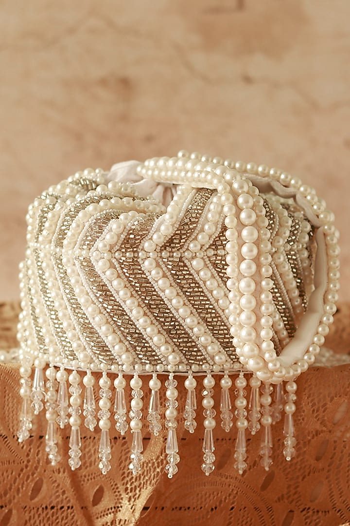 White Raw Silk Glass Beads Hanging Hand Embroidered Mini Potli by THE TAN CLAN at Pernia's Pop Up Shop