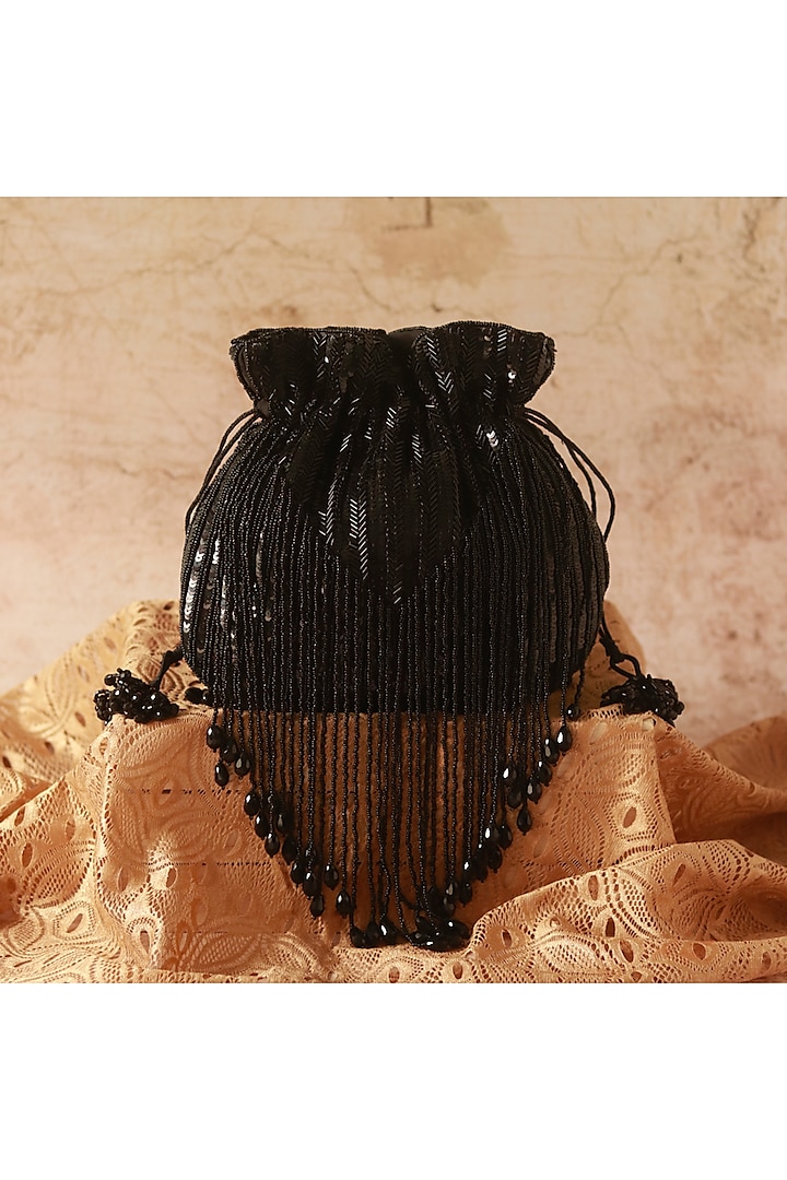 Black Silk Tassels & Sequins Hand Embroidered Potli by THE TAN CLAN at Pernia's Pop Up Shop