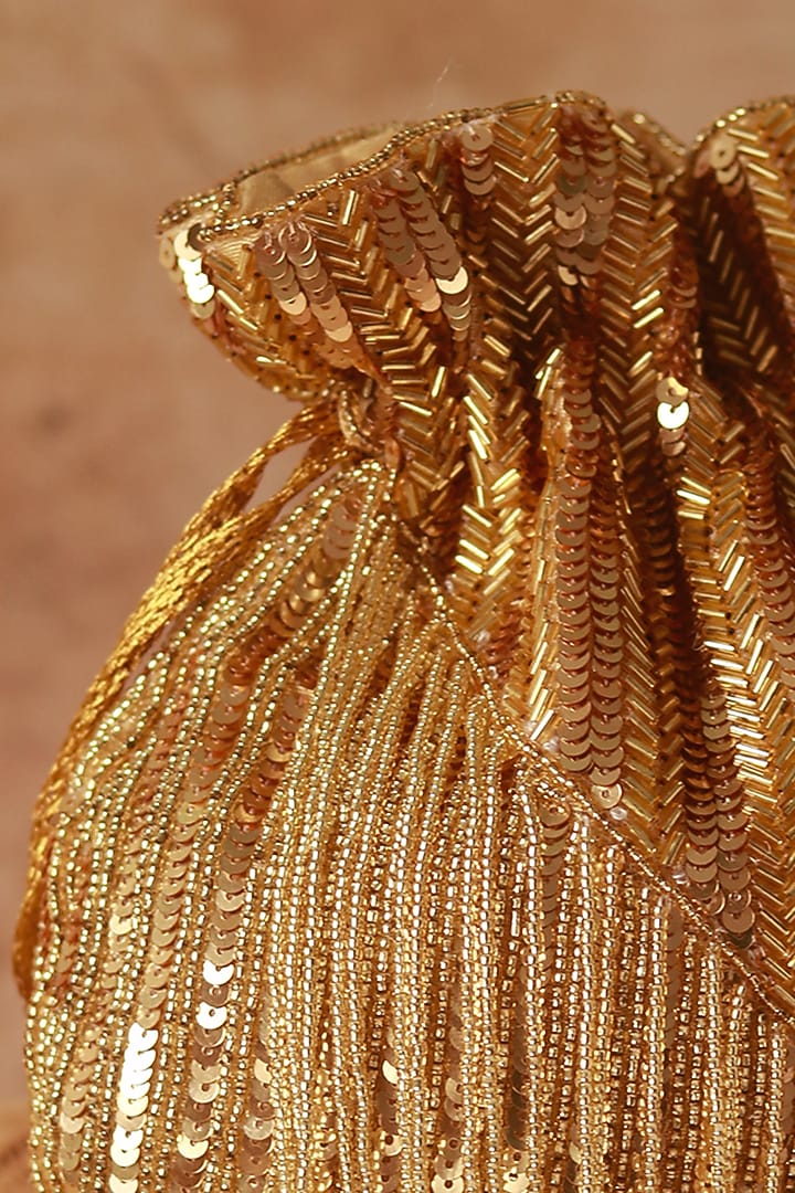 Gold Silk Tassels & Sequins Hand Embroidered Potli by THE TAN CLAN at Pernia's Pop Up Shop