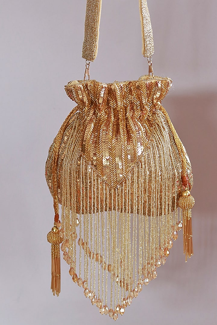Gold Silk Tassels & Sequins Hand Embroidered Potli by THE TAN CLAN at Pernia's Pop Up Shop