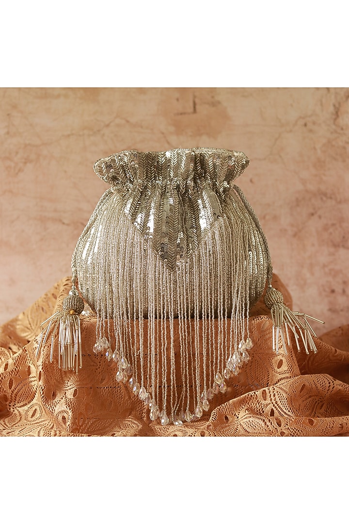 Silver Silk Tassels & Sequins Hand Embroidered Potli by THE TAN CLAN at Pernia's Pop Up Shop