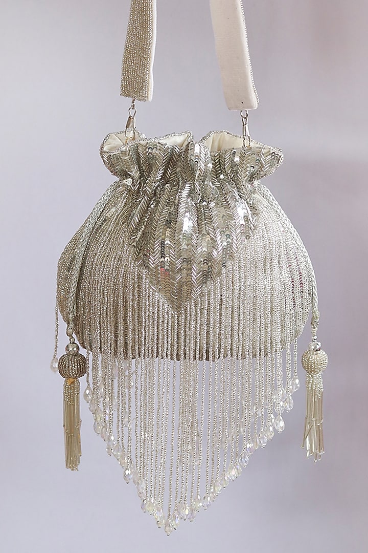 Silver Silk Tassels & Sequins Hand Embroidered Potli by THE TAN CLAN at Pernia's Pop Up Shop