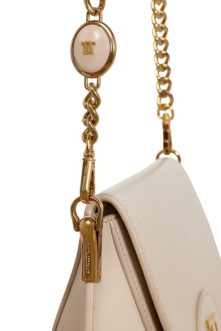 Dove Grey Leather Sling Bag by Tarun Tahiliani Accessories at Pernia's Pop Up Shop