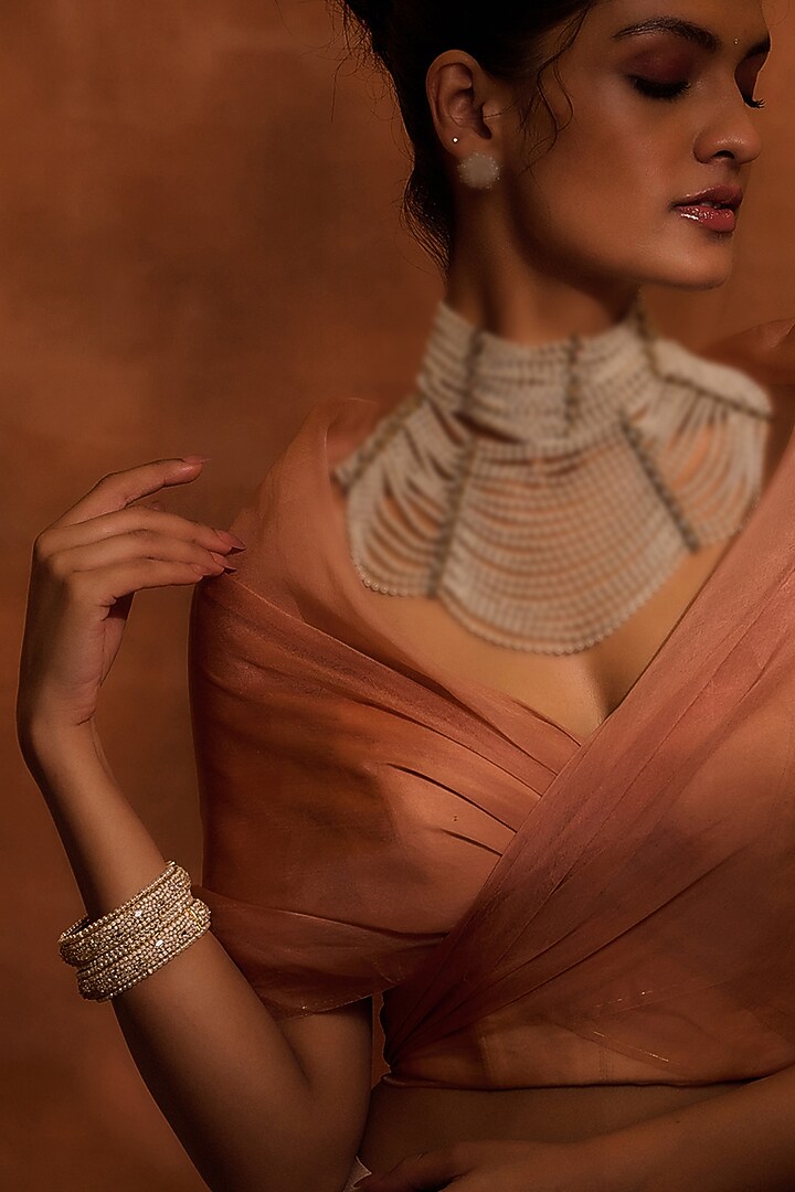 Gold Finish Zircons & Pearl Bangle In Sterling Silver (Set of 2) by Tarun Tahiliani Jewellery at Pernia's Pop Up Shop