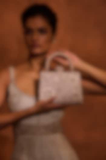 Blush Poly Organza & Viscose Satin Tassel Embellished Clutch by Tarun Tahiliani Accessories at Pernia's Pop Up Shop