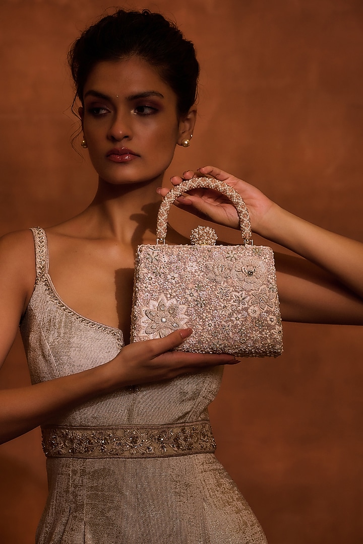 Blush Poly Organza & Viscose Satin Tassel Embellished Clutch by Tarun Tahiliani Accessories at Pernia's Pop Up Shop
