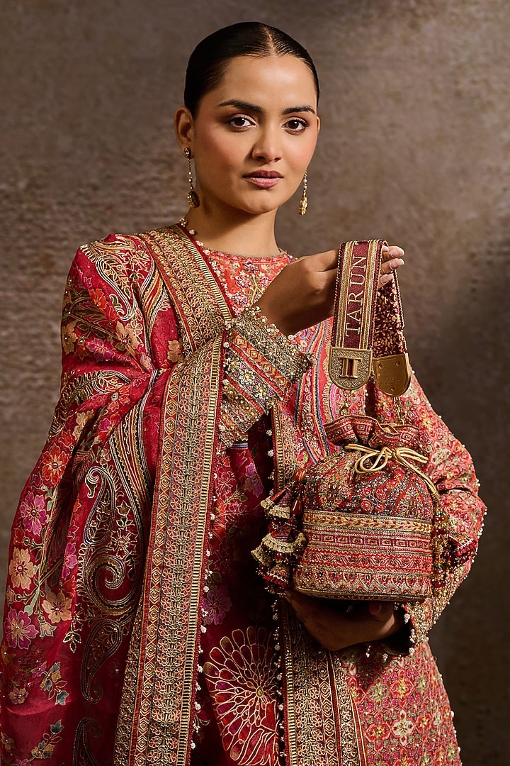 Maroon Brass Kashida Embroidered Potli by Tarun Tahiliani Accessories at Pernia's Pop Up Shop