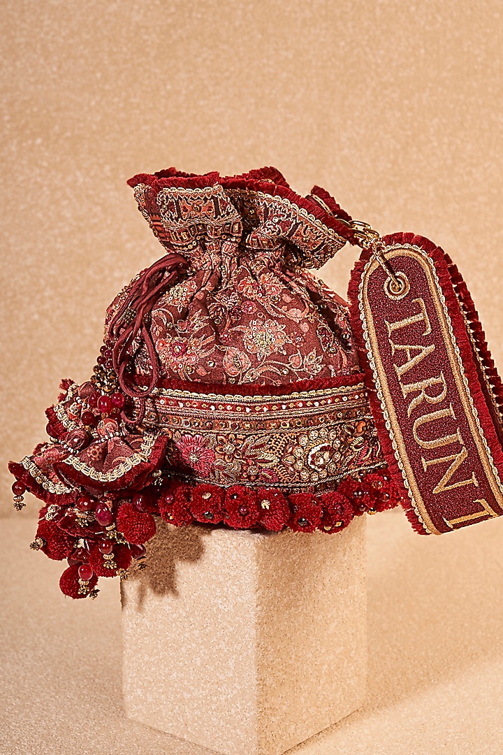Maroon Viscose Satin & Cotton Mulmul Hand Embroidered Potli Bag by Tarun Tahiliani Accessories at Pernia's Pop Up Shop