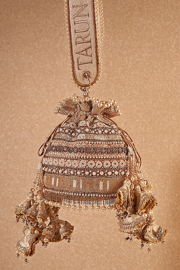Ivory Gold Poly Dupion & Viscose Satin Hand Embroidered Potli Bag by Tarun Tahiliani Accessories at Pernia's Pop Up Shop