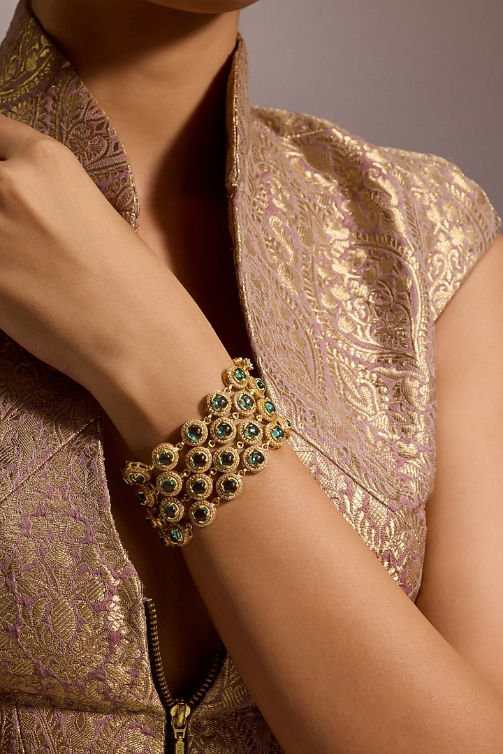 Gold Finish Emerald Stone & Zircon Layered Bracelet In Sterling Silver by Tarun Tahiliani Accessories at Pernia's Pop Up Shop