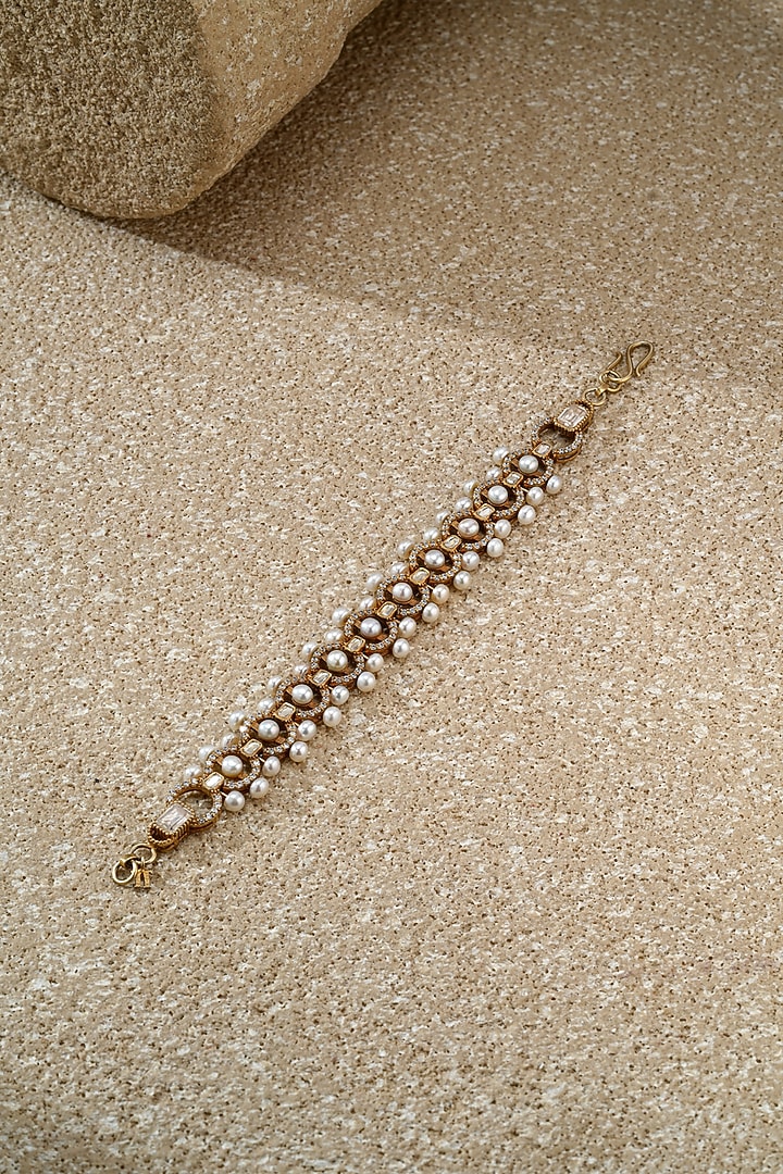 Gold Plated Zircon & Swarovski Pearl Bracelet In Sterling Silver by Tarun Tahiliani Jewellery at Pernia's Pop Up Shop