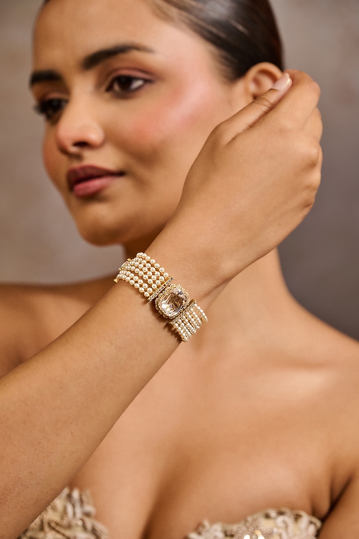 Gold Plated Zircon & Ivory Swarovski Pearl Bracelet In Sterling Silver by Tarun Tahiliani Accessories at Pernia's Pop Up Shop
