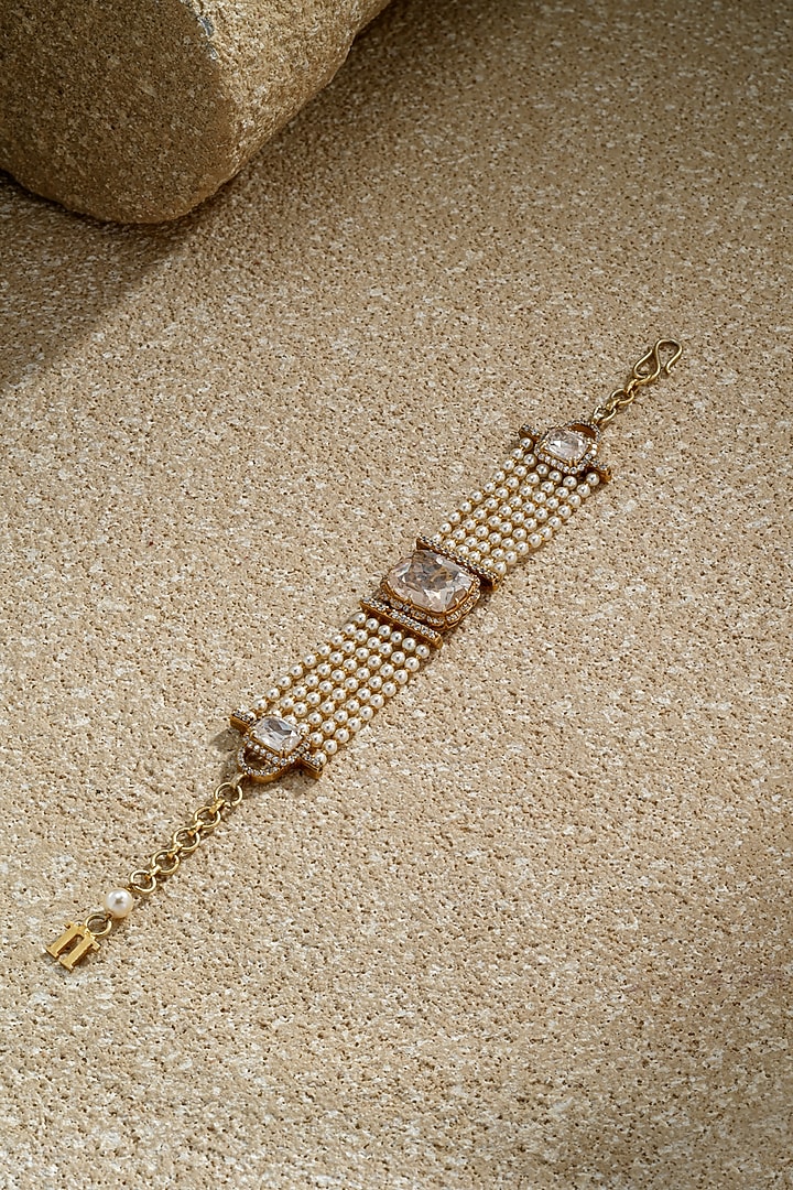 Gold Plated Zircon & Ivory Swarovski Pearl Bracelet In Sterling Silver by Tarun Tahiliani Jewellery at Pernia's Pop Up Shop