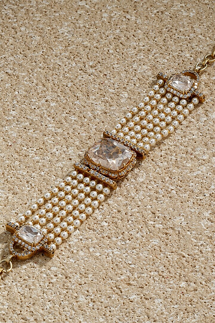 Gold Plated Zircon & Ivory Swarovski Pearl Bracelet In Sterling Silver by Tarun Tahiliani Jewellery at Pernia's Pop Up Shop