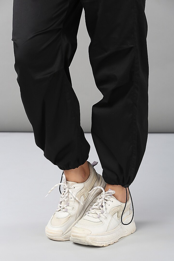 Black Cotton Parachute Pants by TUNA ACTIVE at Pernia's Pop Up Shop