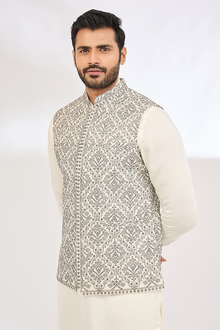 White Polyester Thread & Zari Embroidered Bundi Jacket by TushPosh