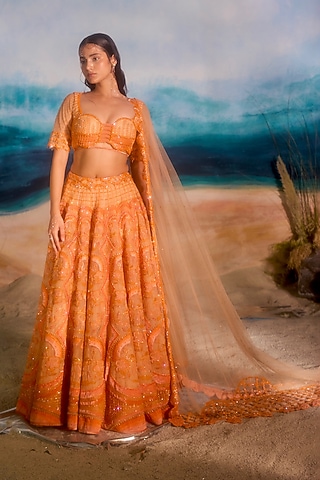 Peach Silk Velvet Bead Embellished Lehenga Set by TUHINA SRIVASTAVA