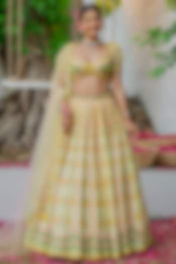 Yellow Silk & Silk Organza Velvet Cutdana Embroidered Bridal Lehenga Set by TUHINA SRIVASTAVA at Pernia's Pop Up Shop