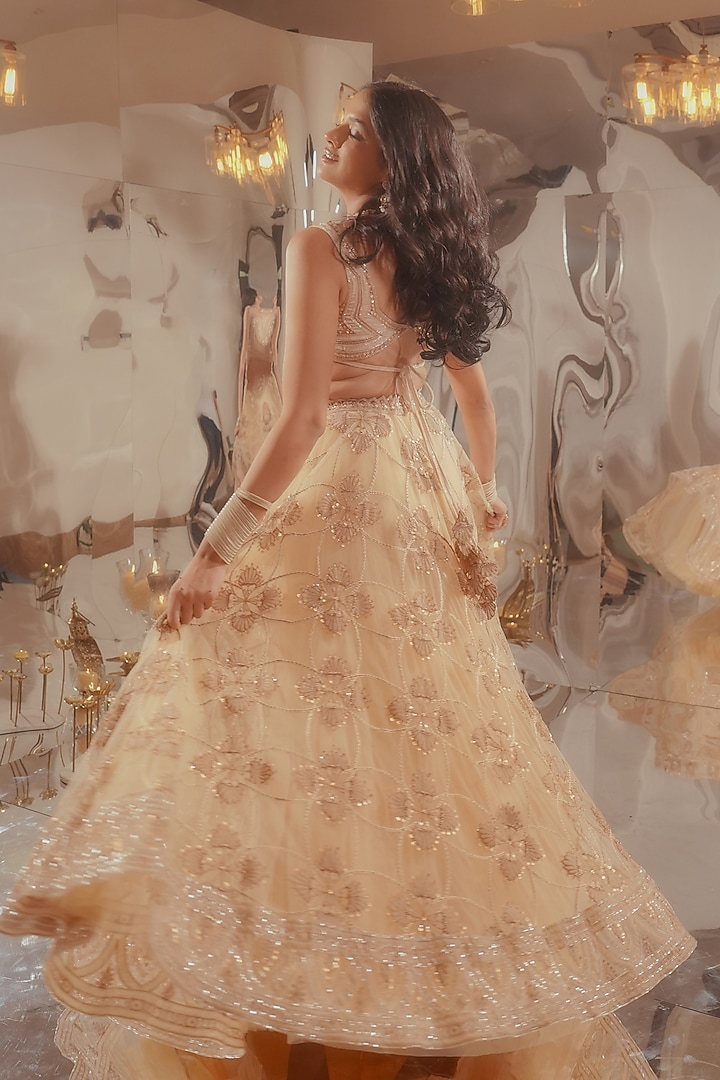 Beige Tulle & Silk Velvet Zari Embroidered Bridal Lehenga Set by TUHINA SRIVASTAVA at Pernia's Pop Up Shop