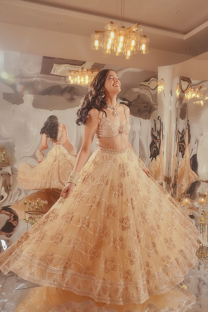 Beige Tulle & Silk Velvet Zari Embroidered Bridal Lehenga Set by TUHINA SRIVASTAVA at Pernia's Pop Up Shop