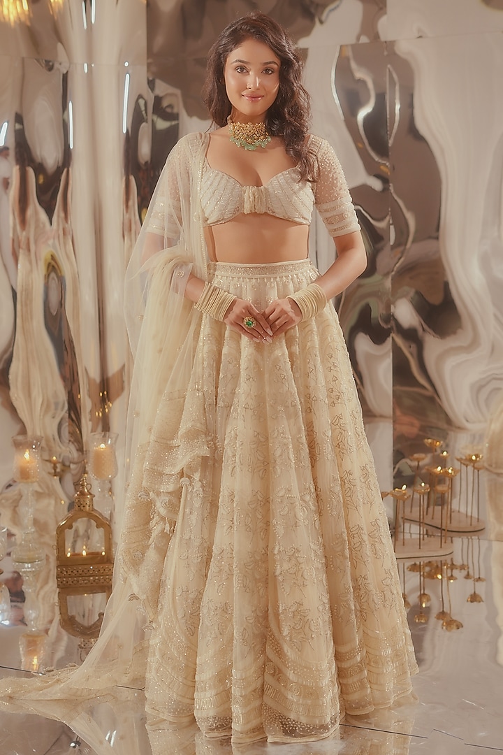 Off-White Tulle & Silk Organza Zari Embroidered Bridal Lehenga Set by TUHINA SRIVASTAVA at Pernia's Pop Up Shop