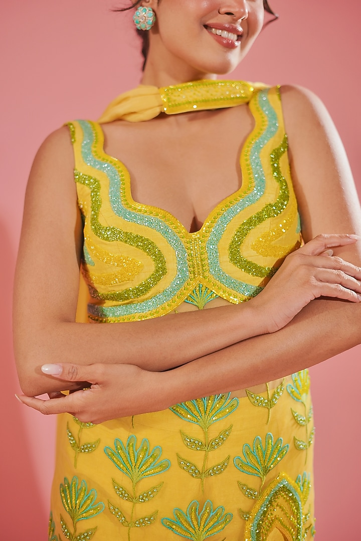 Yellow Silk Organza Floral & Cutdana Embroidered Kurta Set by TUHINA SRIVASTAVA at Pernia's Pop Up Shop