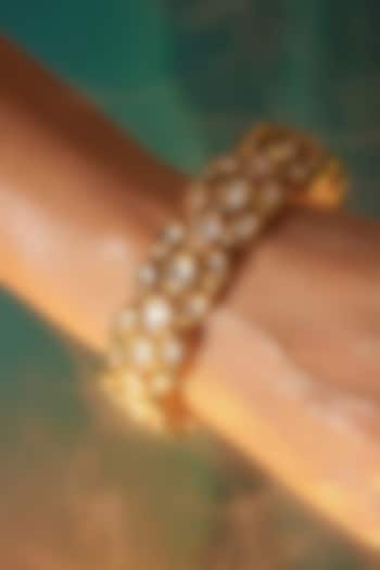 Micro Gold Finish Kundan Polki & Pearl Bangles (Set Of 2) by Tussya at Pernia's Pop Up Shop