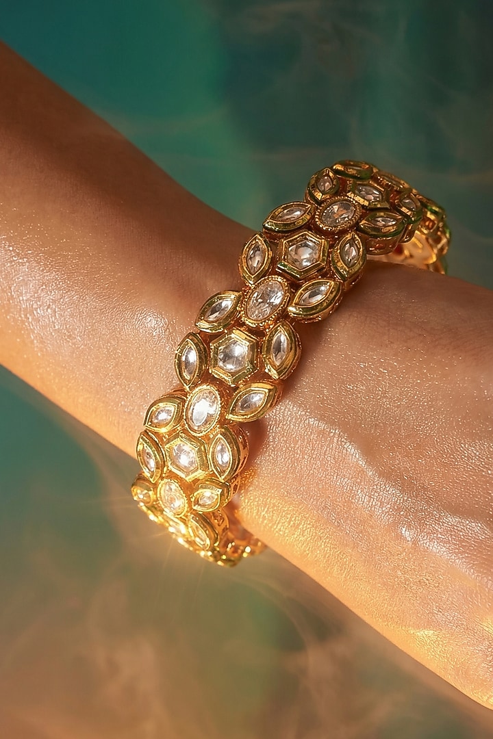 Micro Gold Finish Kundan Polki & Pearl Bangles (Set Of 2) by Tussya at Pernia's Pop Up Shop