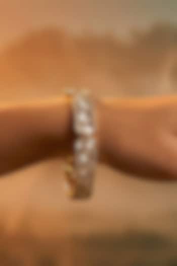 Micro Gold Finish Kundan Polki & Pearl Bangles (Set Of 2) by Tussya at Pernia's Pop Up Shop