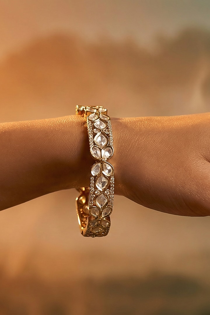 Micro Gold Finish Kundan Polki & Pearl Bangles (Set Of 2) by Tussya at Pernia's Pop Up Shop