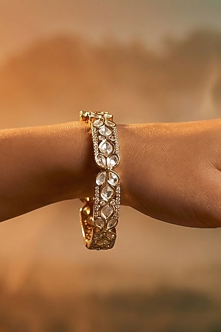 Micro Gold Finish Kundan Polki & Pearl Bangles (Set Of 2) by Tussya