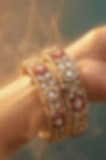 Micro Gold Finish Kundan Polki & Pearl Bangles (Set Of 2) by Tussya at Pernia's Pop Up Shop