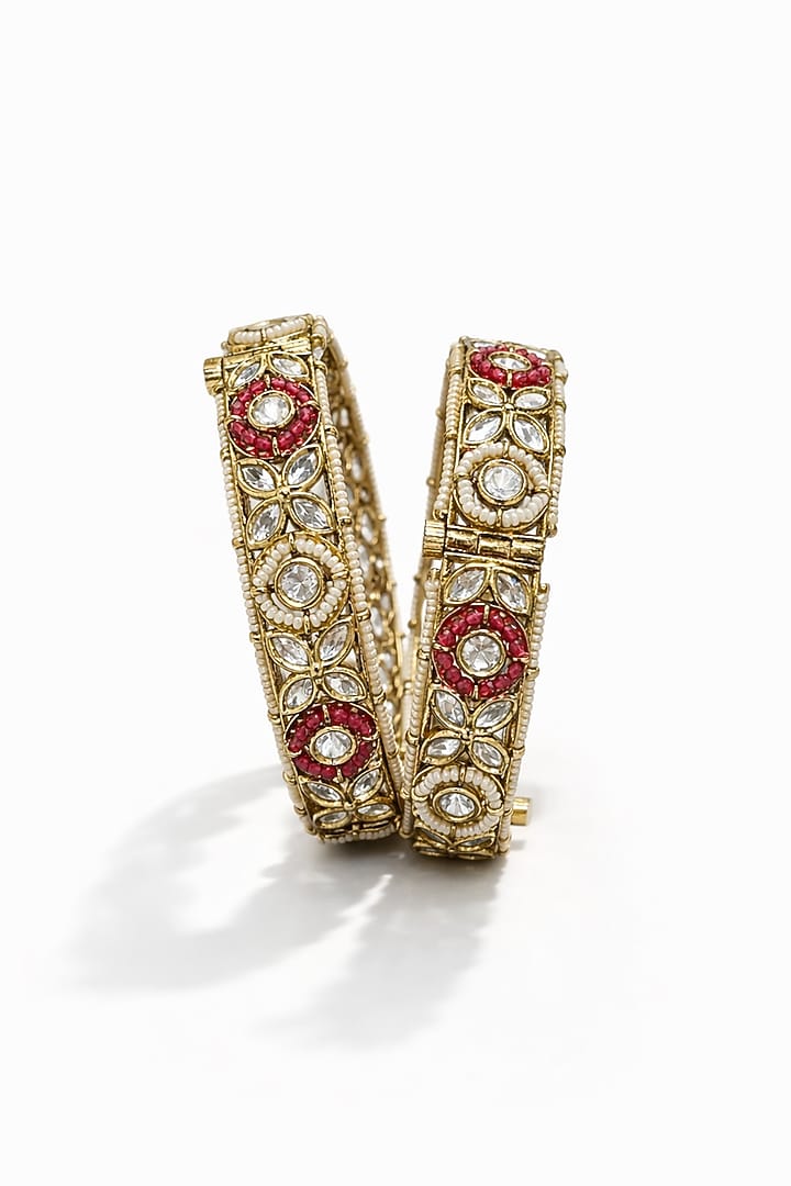 Micro Gold Finish Kundan Polki & Pearl Bangles (Set Of 2) by Tussya at Pernia's Pop Up Shop