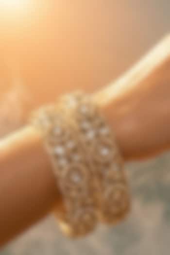 Micro Gold Finish Kundan Polki & Pearl Bangles (Set Of 2) by Tussya at Pernia's Pop Up Shop
