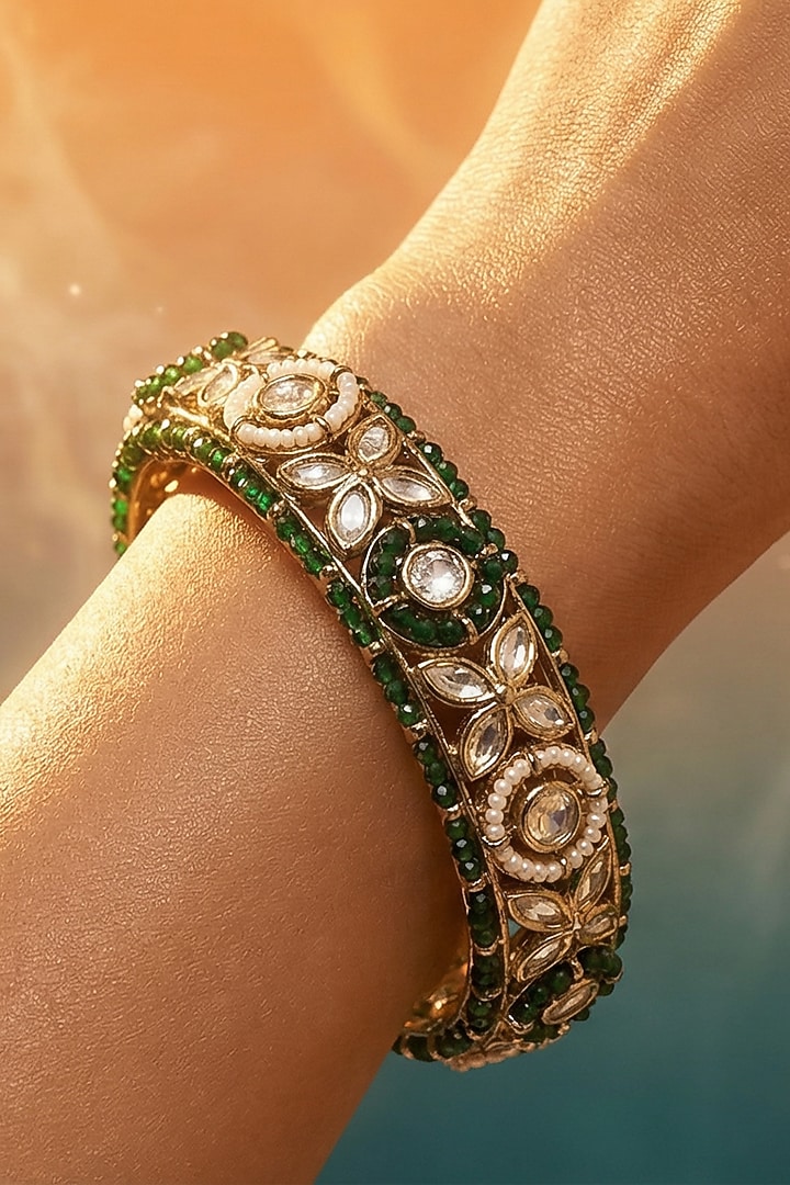 Micro Gold Finish Kundan Polki & Pearl Bangles (Set Of 2) by Tussya at Pernia's Pop Up Shop