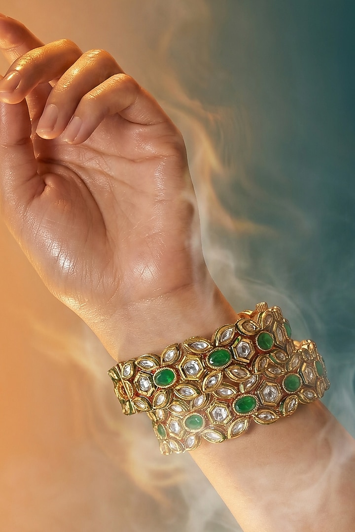 Micro Gold Finish Kundan Polki & Pearl Bangles (Set Of 2) by Tussya at Pernia's Pop Up Shop