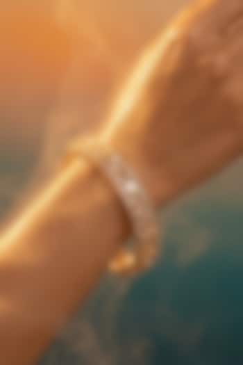 Micro Gold Finish Kundan Polki & Pearl Bangles (Set Of 2) by Tussya at Pernia's Pop Up Shop