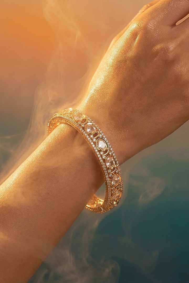 Micro Gold Finish Kundan Polki & Pearl Bangles (Set Of 2) by Tussya at Pernia's Pop Up Shop