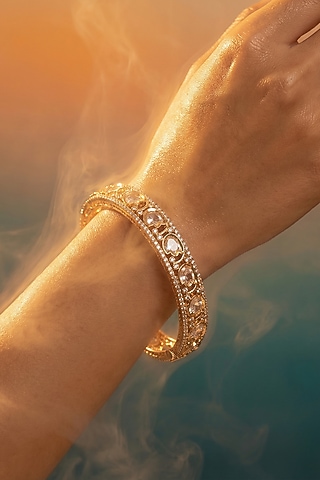 Micro Gold Finish Kundan Polki & Pearl Bangles (Set Of 2) by Tussya