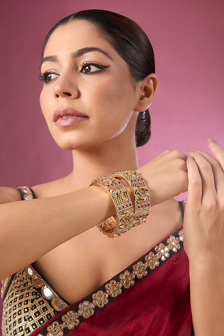 Gold Finish Temple Bangles (Set Of 2) by Tussya at Pernia's Pop Up Shop
