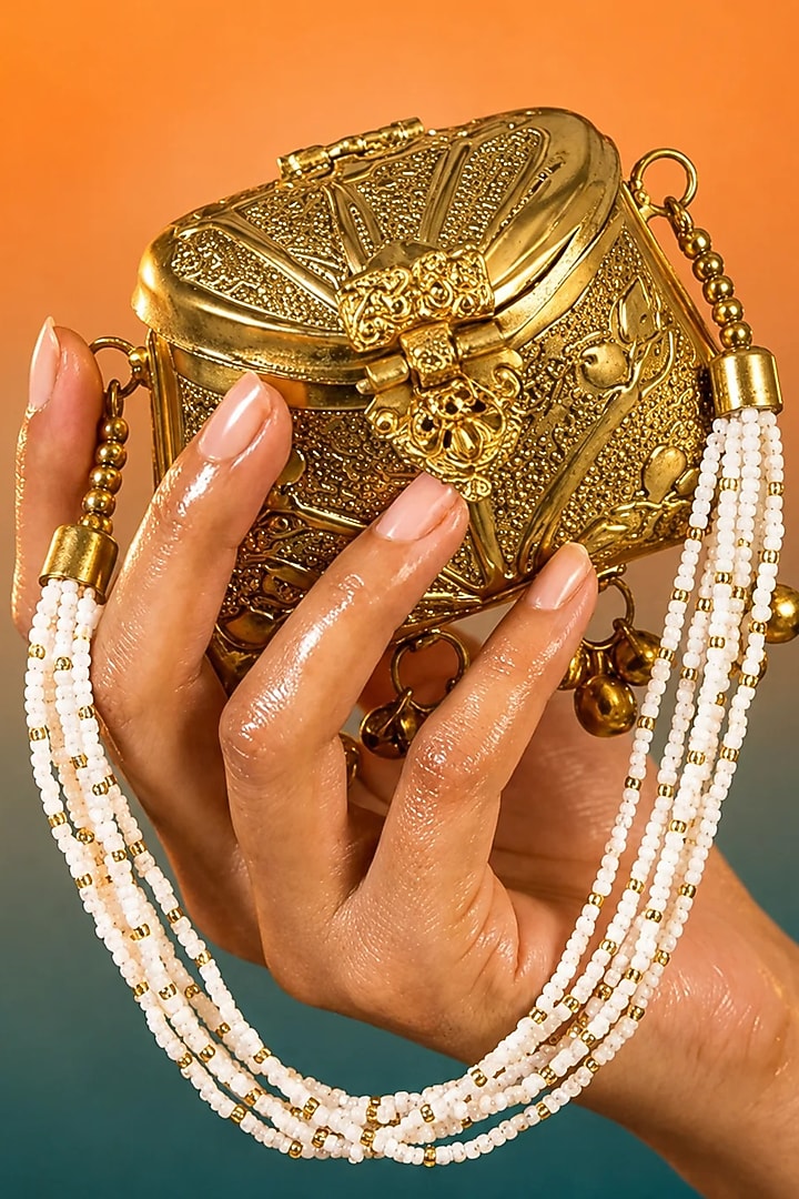 Gold Brass Pearl Beaded Sling Bag by Tussya at Pernia's Pop Up Shop