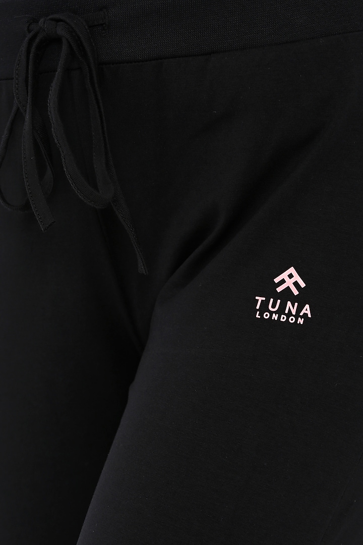 Black Jogger Pants With Mesh Side Panels by TUNA ACTIVE at Pernia's Pop Up Shop
