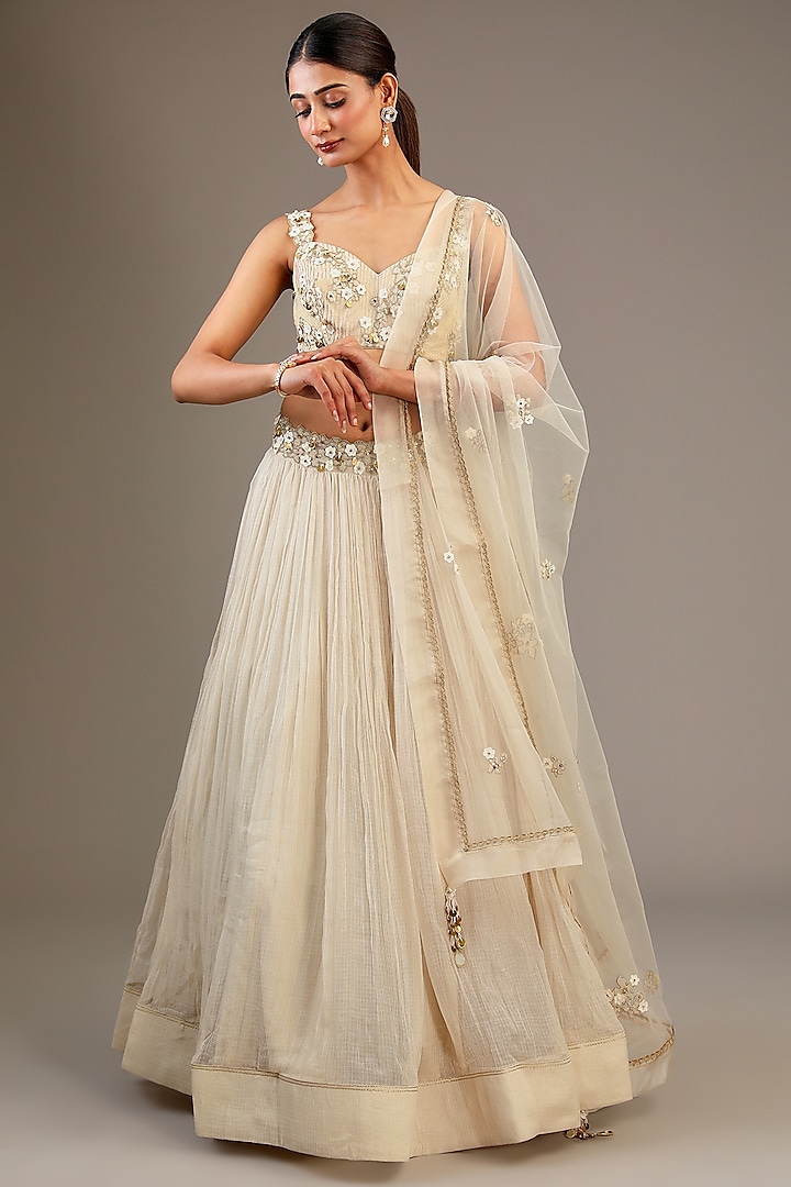 Off-White Kota Aari Hand Embroidered Wedding Lehenga Set by Taavare at Pernia's Pop Up Shop