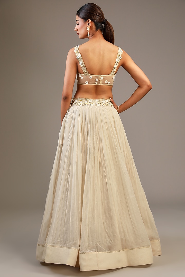 Off-White Kota Aari Hand Embroidered Wedding Lehenga Set by Taavare at Pernia's Pop Up Shop