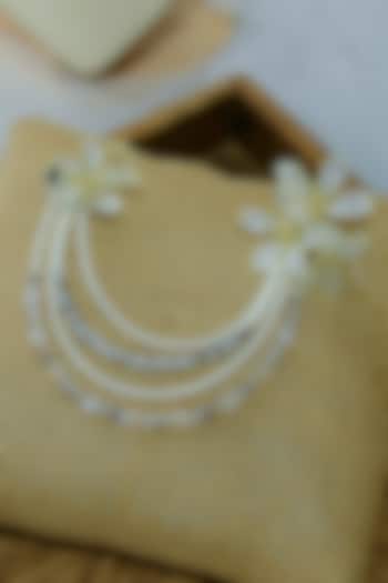 White Floral Earrings by The Vintage Snob