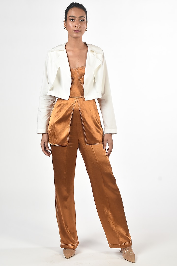Brown Jumpsuit With White Trench Coat by Twinkle Hanspal